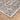 Decorative rug with intricate patterns on a wooden floor