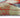 Detailed corner of Tiffany Autumn Leaf Modern Rug with colourful autumn leaf design