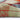 Detailed corner of Tiffany Autumn Leaf Modern Rug with colourful autumn leaf design