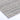 A close-up of a textured woven rug corner showing a heathered pattern of gray, beige, and white fibers on a white background.