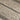 Close-up of textured beige and brown carpet