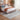 Bluehaven Grey distressed rug styled in a modern bedroom
