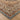 Decorative rug with intricate patterns on a wooden floor
