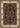 Decorative rug with intricate black and beige pattern on a border