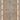Decorative rug with intricate patterns on a blue and beige background