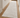 Light cream textured hallway runner in a bright interior