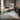 Bluehaven Light Grey distressed transitional rug styled in a modern living room