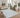 Coastal Mist Pebble Grey rug styled in a bright contemporary living room