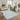 Coastal Mist Pebble Grey rug styled in a bright contemporary living room