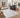 Coastal Mist Soft Ash rug styled in a bright contemporary living room