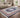 Signet Royal Navy Rug styled in a living room