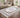 Signet Ivory Heritage Rug styled in a living room