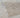 Stone washed light brown area rug surface and tonal detail