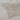 Stone washed light brown area rug surface and tonal detail