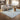 Soft ivory rug styled in a contemporary neutral interior