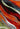 Flatlay of Tiffany abstract rug in red, lime, black and grey tones