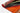 Colourful rug edge showing orange and red design