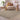 Cosy Cloud Plain Brown Rug styled in a warm modern living room