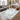 Logan Classic Silver Medallion Rug styled in an elegant interior