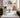 Logan Ivory Heritage Border Rug styled in a contemporary living room
