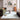 Logan Silver Heritage Border Rug styled in a contemporary living room