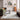 Logan Soft Mist Abstract Rug styled in a contemporary living room