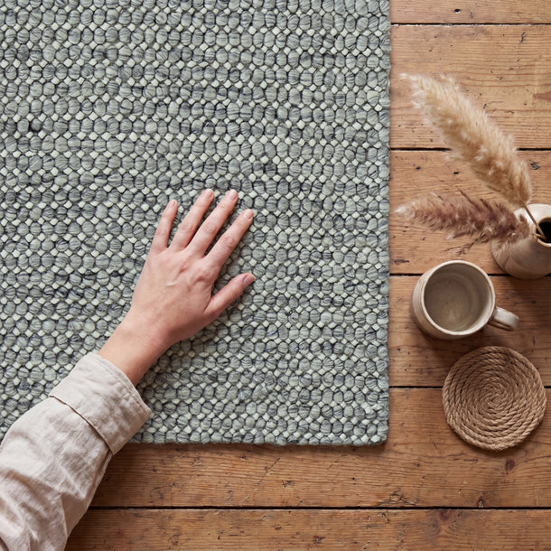 Scandi Pebble Soft Storm 100% wool textured rug in soft grey charcoal neutral tones