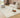 Uluru Clay Warm Neutral Rug styled in a contemporary warm neutral living room