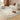Uluru Mist Contemporary Rug styled in a light modern living room