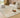 Uluru Sandstone Earth Tone Rug styled in a warm contemporary living room