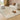 Uluru Sandstone Earth Tone Rug styled in a warm contemporary living room