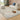 Uluru Sky Textured Modern Rug styled in a light contemporary living room