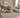Grey Wool Weave Wool Rug in a natural light lifestyle room setting